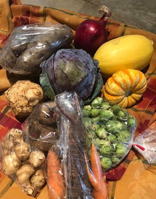 Locally grown vegetables, squash and cabbage at Bee Healthy